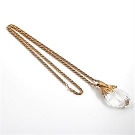 Jean Paris 18K Yellow Gold Carved Quartz Crystal Pendant Chain Necklace: A Jean Paris 18K yellow gold quartz crystal pendant necklace designed with a carved pear shaped pendant mounted in 18K gold with a large hinged bale, presented on a 36" 18K yellow gold rope style chain.