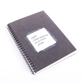 Jane Williams Oils on Paper Sketch Book Journal: A sketchbook journal. This piece features a soft and ring binding as well as featuring sixteen oil on paper paintings by the artist Jane W Williams which have been adhered to the pages with notes of the location of the initial creation. The majority of the pieces are signed and dated in the lower corners.