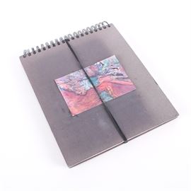 Jane Williams Painting Book: A painting book. This piece is presented in a hard and ring binding and contains fourteen paintings from the artist Jane W. Williams with the artist’s signature present on the corners of each work. The book is secured using a cord that covers the exterior of the art book.