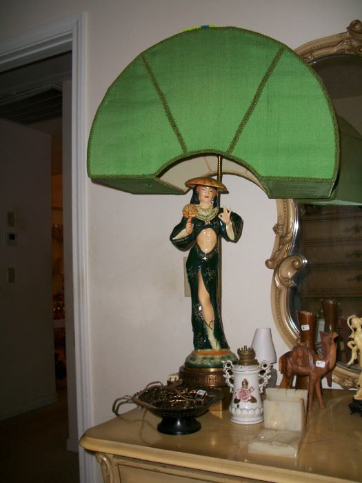 Vintage Asian female figural lamp with silk shade.
