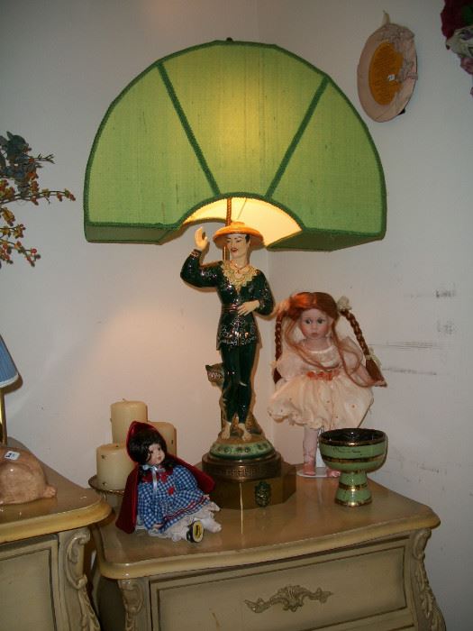 Vintage Asian male figural lamp with silk shade.