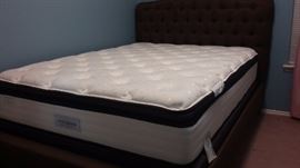 Padded Queen size bed with Hampton Rhodes mattress and box spring...almost new.