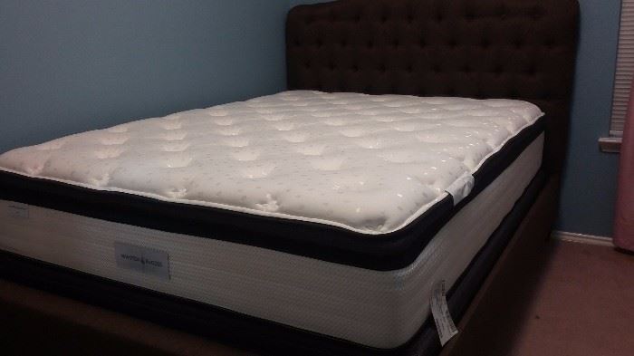 Padded Queen size bed with Hampton Rhodes mattress and box spring...almost new.