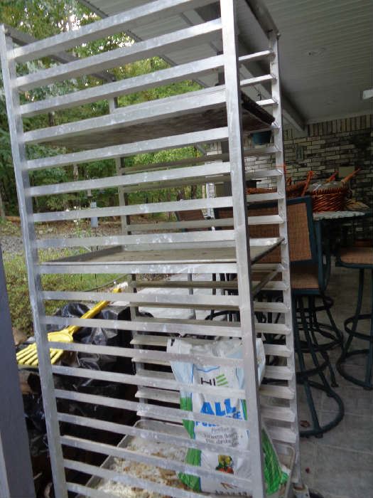 this is a restaurant bread rack but the slide out trays are missing, am not sure what it could  be used for - am sure someone will figure out a use for it