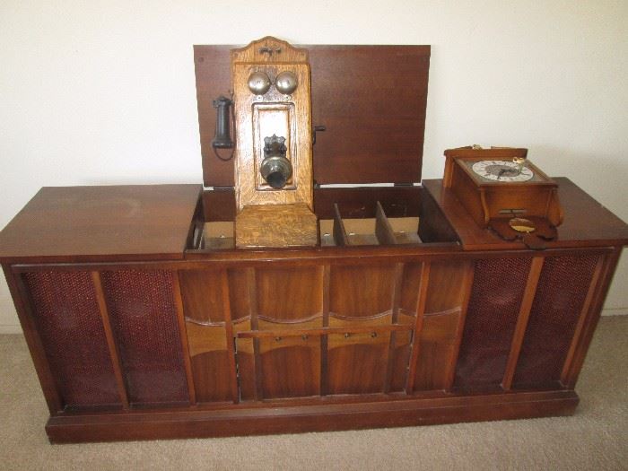 Great looking Stereo Console Cabinet.  Note the wall-mount Clock and old Telephone unit!