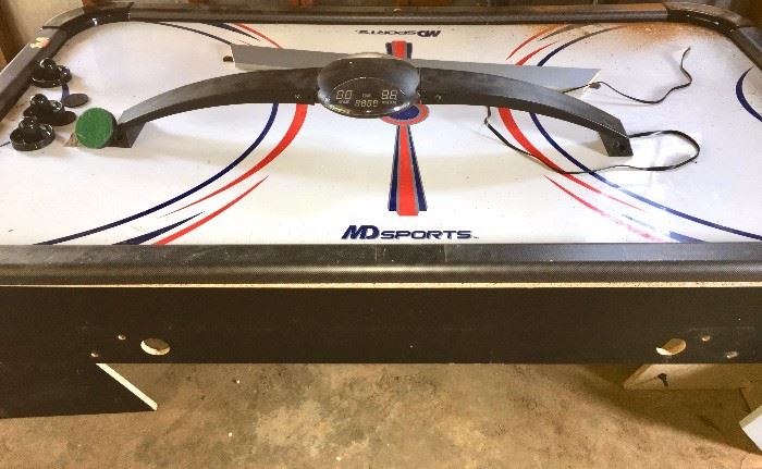 MD Sports air-hockey table with puck and paddles (shown dissembled)