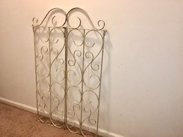 Scrolling iron gate in two pieces