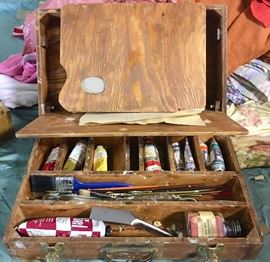 Antique portable artist's supply box with still-soft oils and tools