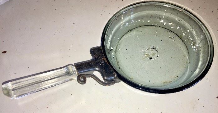 Pyrex glass skillet with glass handle and cast-iron hardware