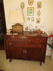 Self storing dining room table