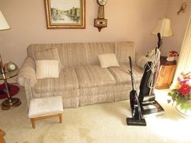 Sofa, vacuums and lamps