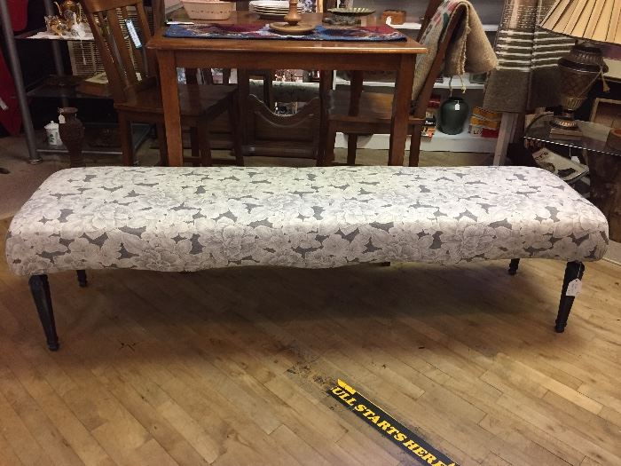 71" long bench can fit at the foot of a king bed