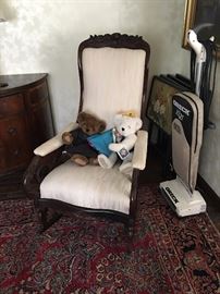 Wooden Rocking Chair with White/Cream Upholstery. Family Heritage Estate Sales, LLC. New Jersey Estate Sales/ Pennsylvania Estate Sales