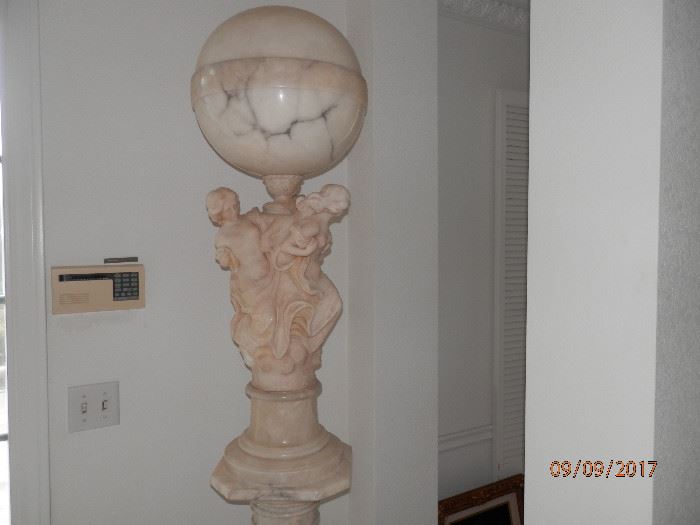 Solid marble "3 maiden" sculpture' lamp...approximately 40 inches high....sitting on white marble column...
