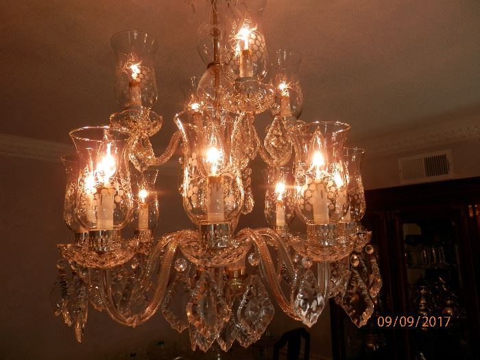 Dining Room crystal Chandelier with etched hurricane globes.