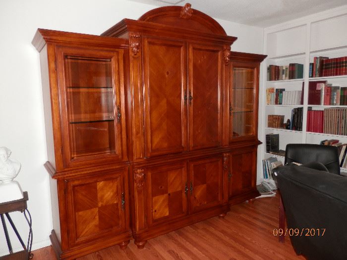 3 piece entertainment armoire and display....end units are lighted with glass shelves....not a scratch!