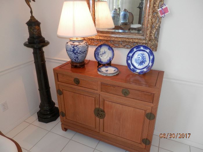 Contemporary Asian buffet,  large beveled accent mirror of which there are 2 alike.   