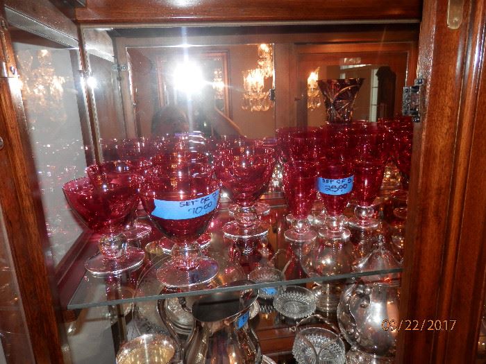 Fine hand blown crystal cranberry glass on clear ball base formal glassware....37 pieces