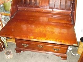 Desk with lid dropped down to show desk