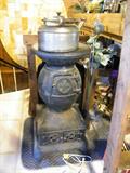 One of several cast iron pot belly wood stoves.