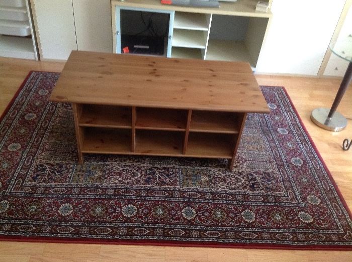 Large wood coffee table with compartments, IKEA rug