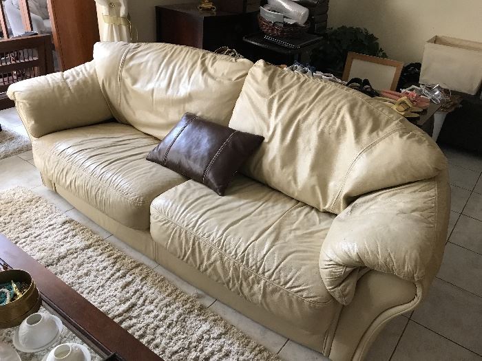 THERE'S A PAIR OF THESE LEATHER COUCHES, WHICH ARE IN GOOD CONDITION