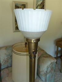 Tall table lamp with bronzed metal base; has milk glass under-shade.  45-1/2" tall.