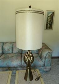 Tall table lamp with bronzed metal base; has milk glass under-shade.  45-1/2" tall.
