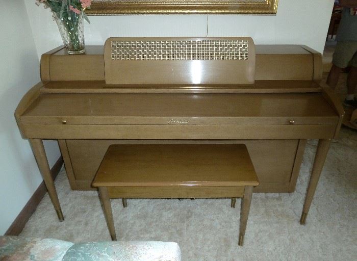 Spinet piano, Acrosonic, by Baldwin.  Solid wood, probably pecan, comes with matching bench with storage area for music.