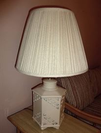 Pair of porcelain table lamps. Cream color with cut-out decoration.