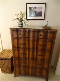 French Provincial chest of drawers which is part of the king-size bedroom suite.