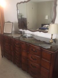 Triple dresser part of king size bedroom suite.