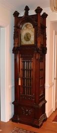 This is a remarkable and extraordinary Clock by Inspire.  It has been thoroughly reviewed by a clock specialist and is in full working order, mint case, with beautiful Gothic carvings.  Truly one of a kind..