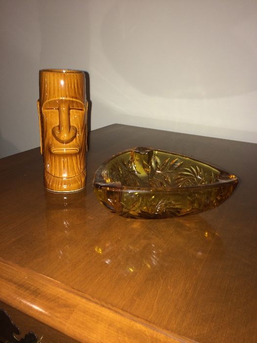 What Mid-Century Rec Room would complete with something from the Tiki style and heavy glass ashtrays? 