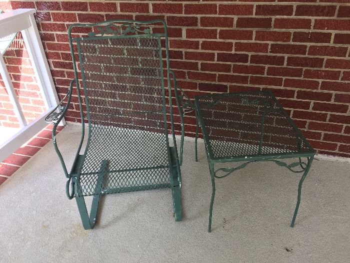 Two iron rockers and two tables