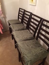 Four of the chairs have slipcovers