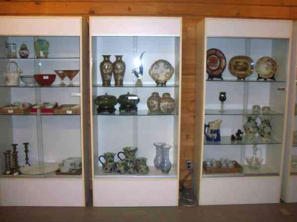Three Lighted Display Cases - items inside cases to be sold separately.