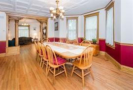 Large Oak dining table.  Shown here with two leaves.  Dimensions with the leaves: 111" x 48".  Table with no leaves is 69" x 48"