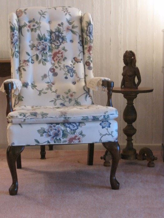 Floral Armchair. Tables and Carvings.