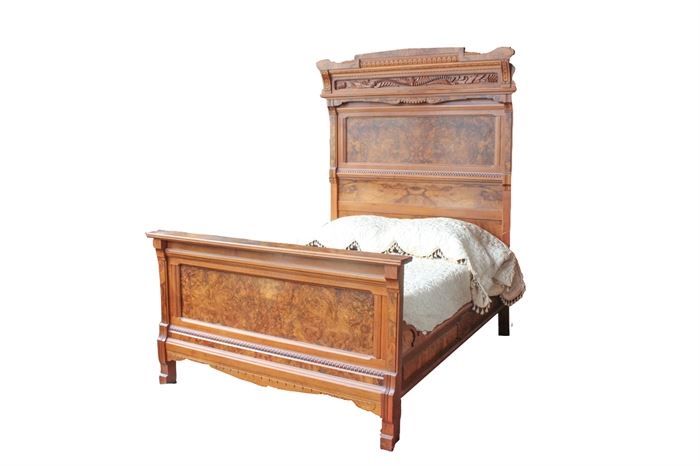 Victorian Walnut High Back Bed: A high back Victorian bed. Featuring walnut and burl veneer accents. Further enhanced by ornate scroll and foliate details. This bed is slot and slat construction, and made for a full size mattress.