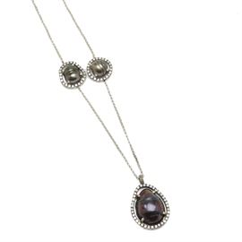 Jordan Alexander Sterling Silver Cultured Pearl and Diamond Necklace: A sterling silver cultured pearl and diamond necklace by Jordan Alexander. This necklace features three sliced baroque pearls with diamond accents on a rolo chain.