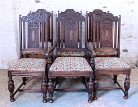 Heavily carved dinner chairs