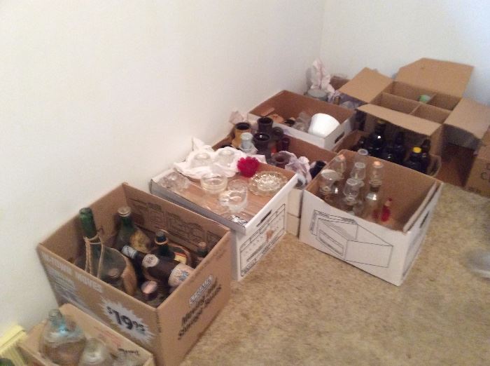 BOXES OF ALL KINDS OF BOTTLES