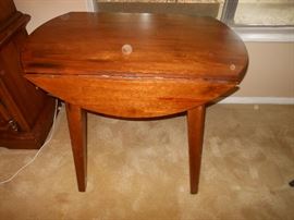 Round to drop sided table