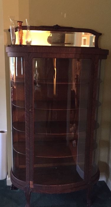 Oak China cabinet with claw feet