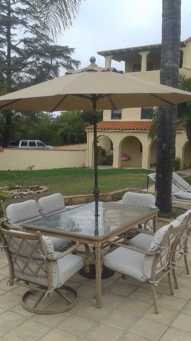 Attractive Patio Table with 6 Chairs, Umbrella and Base. Asking Price $275 (Measures 65" Long/42" Wide/29" Tall)