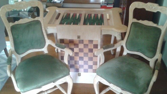 Impressive Carved Wooden Backgammon/Checkers Game Table with Matching Chairs. Can be used as a Regular Table when Game Board is Flipped Over. Asking Price $1795 (Measures 43" Long/30 1/2" Wide/30" Tall)
