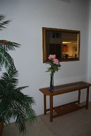 SOFA TABLE, WALL MIRROR, ARTIFICIAL PLANTS