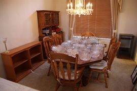 Oak dining room set with hutch and buffet with beautiful crystal galore