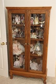 Lovely curio filled with...you guessed it...dolls!